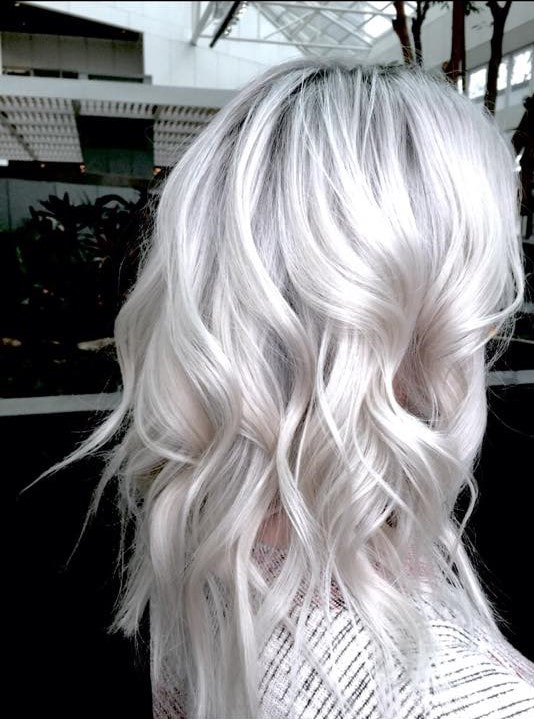 Platinum blonde with shadow root, finished with beach waves. MB Salon color specialist, balayage specialist.