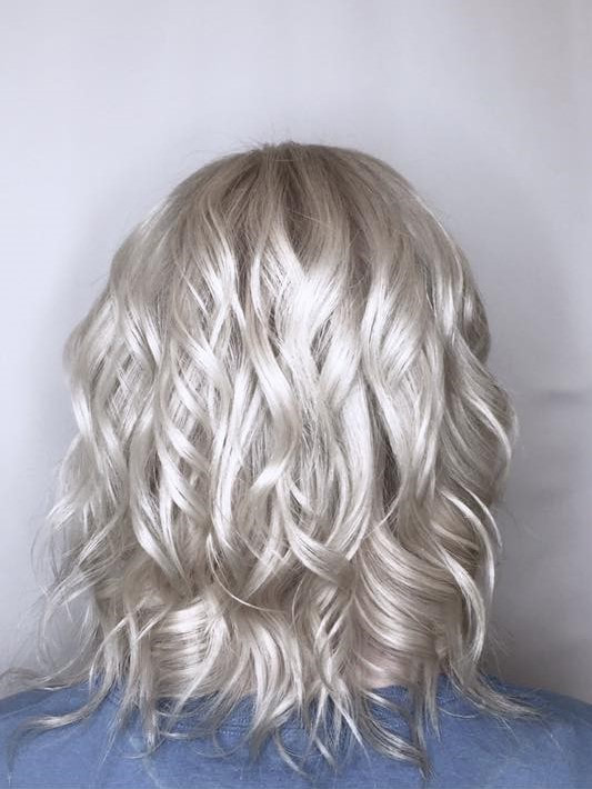 Platinum blonde finished with curls. Featured on Redken! MB Salon color specialist, balayage specialist.