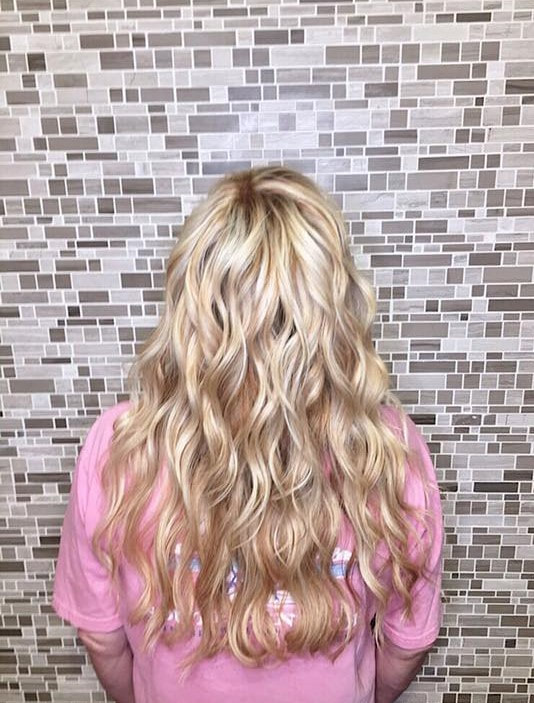Light golden blonde with dimension, finished with beach waves. MB Salon color specialist, balayeg specialist. 